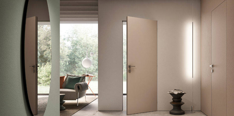Puerta abatible enrasada a la pared