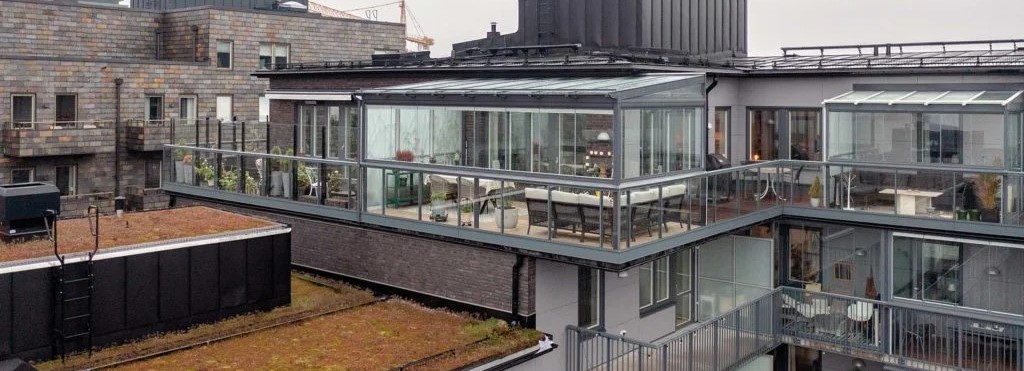 Arquitectura sostenible: porches acristalados como elementos eco en proyectos inmobiliarios